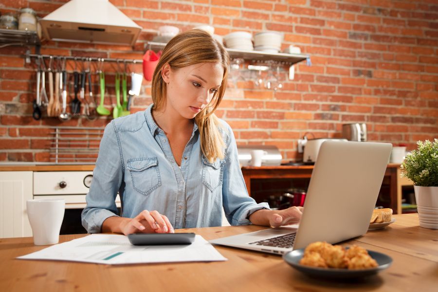 woman budgeting on laptop