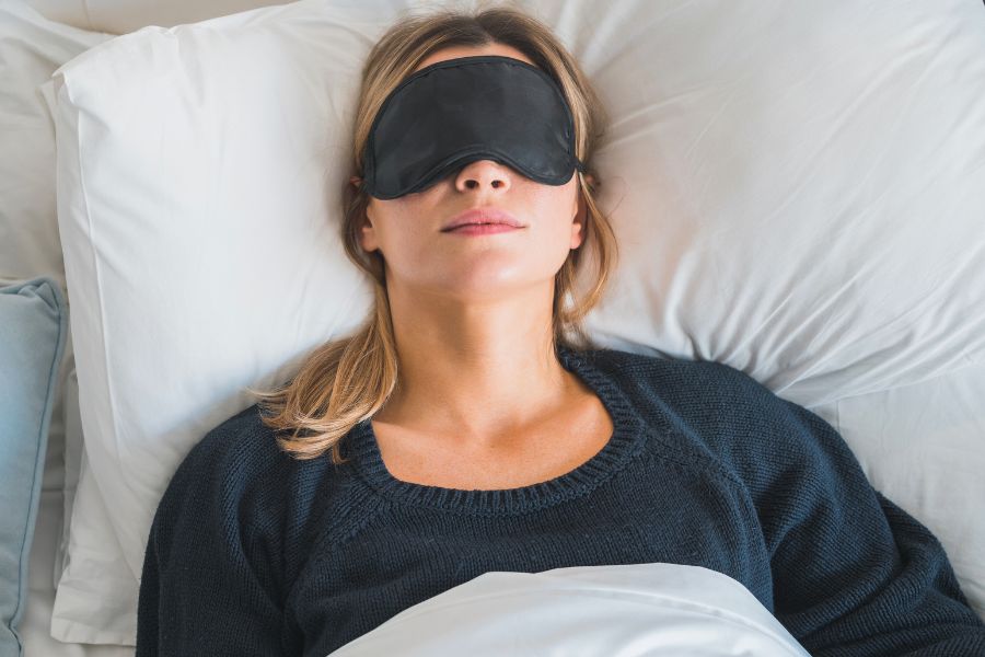 woman sleeping with eye mask on