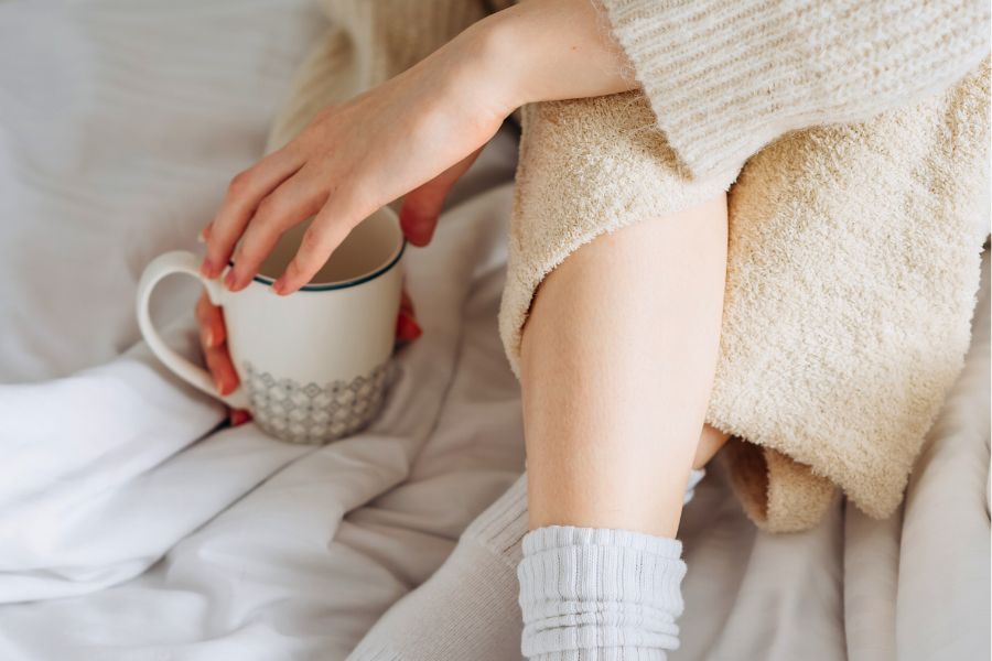cozy socks and robe and mug