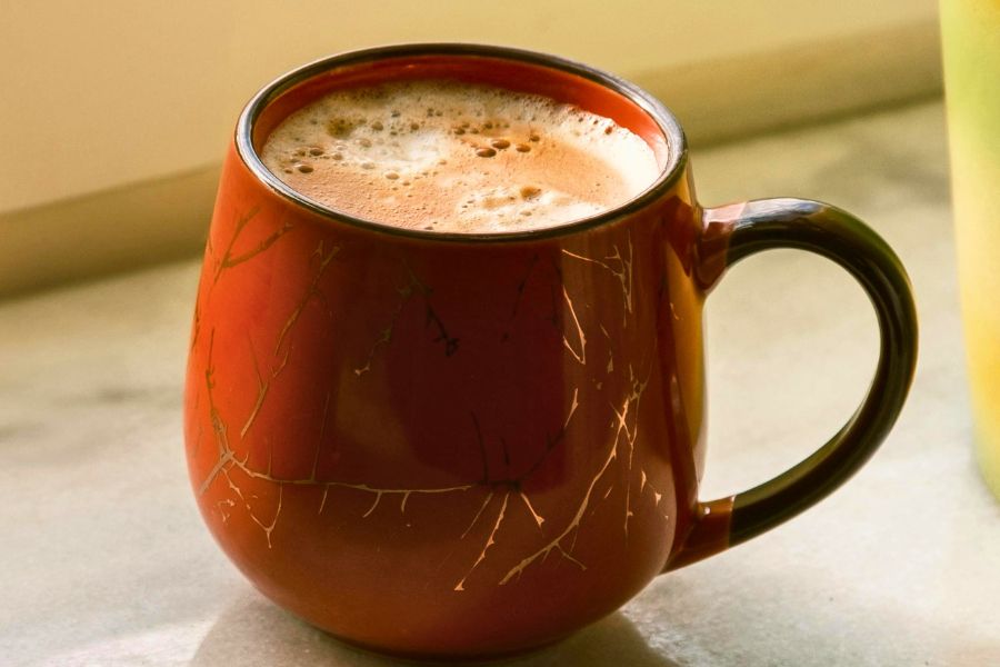 coffee in an orange mug