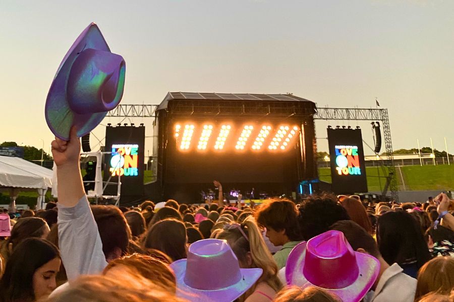 crowd in a concert with stage view